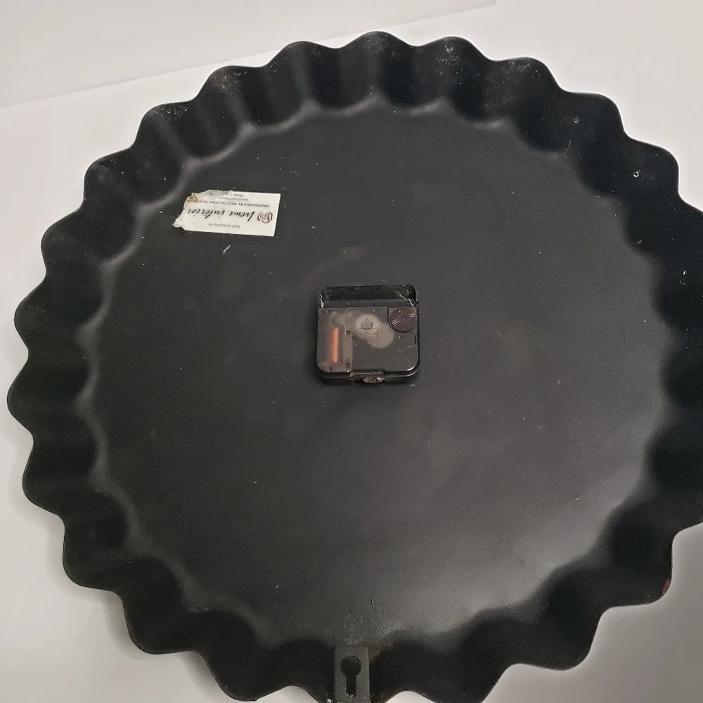 Metal Cowboy clock shaped like bottle cap. 191
